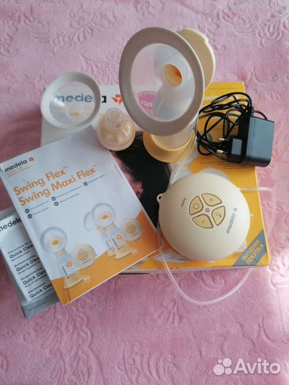 Молокоотсос medela swing электрический