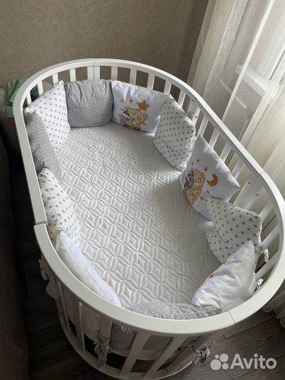 Детская кроватка с маятником круглая