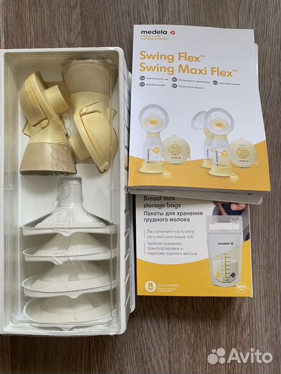 Молокоосос medela swing maxi flex