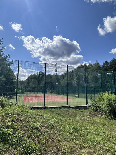 Коттедж 327 м² на участке 18 сот.