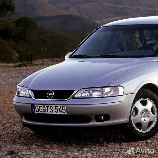 Бампер передний с отверстиями под птф в цвет Opel