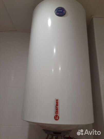 Электрический накопительный водонагревател ь