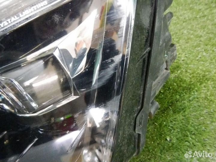 Фара левая Skoda Rapid