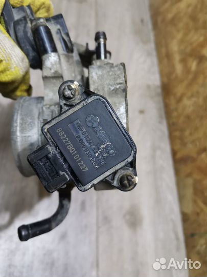 Дроссельная заслонка Kia Spectra