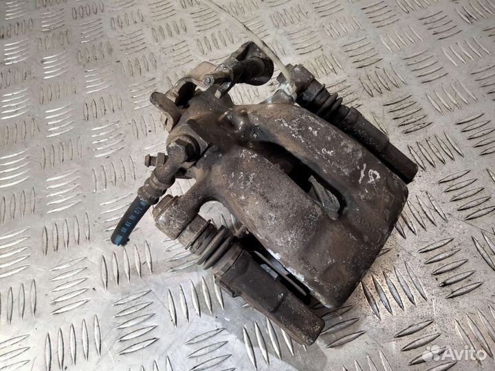 Суппорт задний левый Opel Astra G