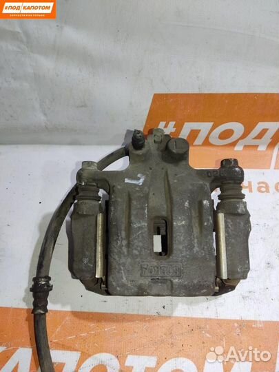 Суппорт тормозной задний левый Mazda CX-7 ER 2009