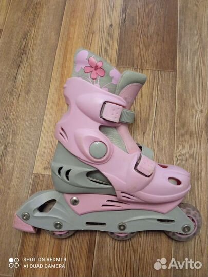 Роликовые коньки