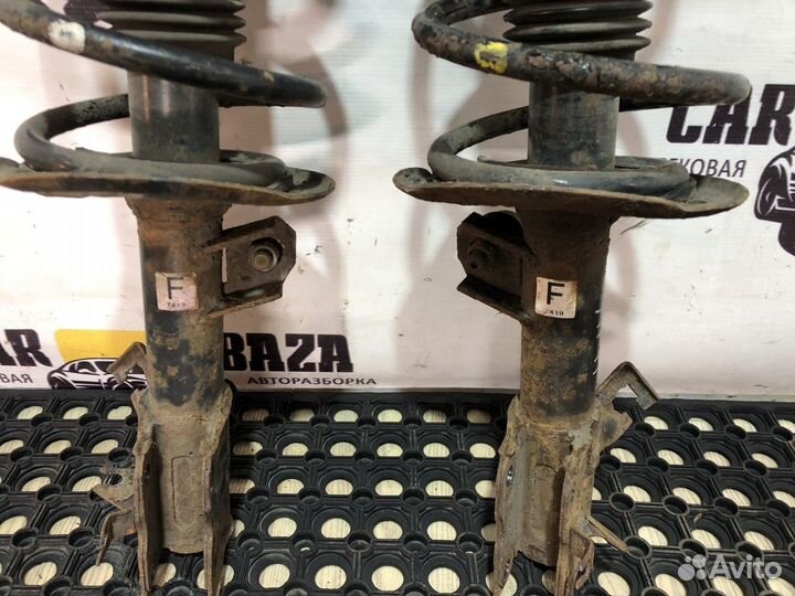 Стойки амортизаторов передние (комплект)