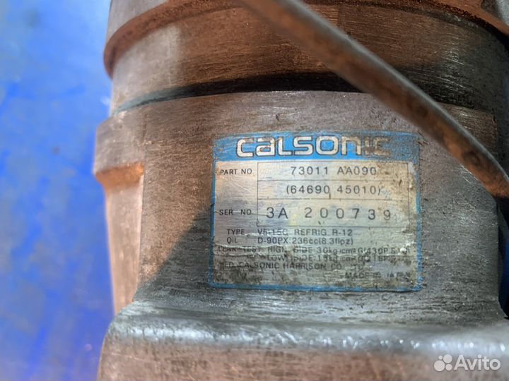 Компрессор кондиционера subaru 73011aa090