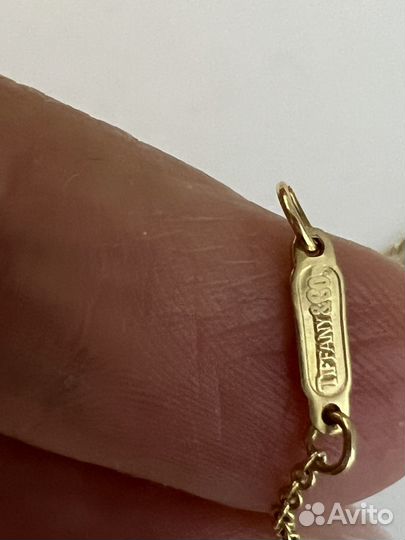 Золотая пoдвеска Tiffany&Co