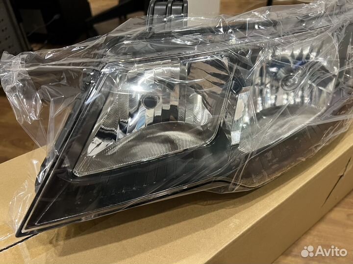 Фара левая Kia Cerato 2008-2013
