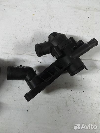 Корпус термостата 03C121111B Skoda 1.2