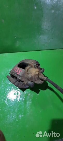 Суппорт тормозной BMW 7-Series слева сзади 3421675