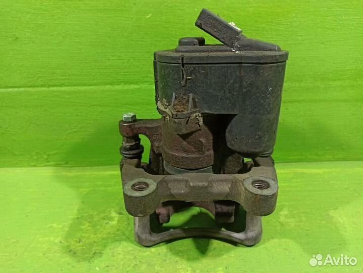 Суппорт тормозной задний правый Volkswagen Tiguan