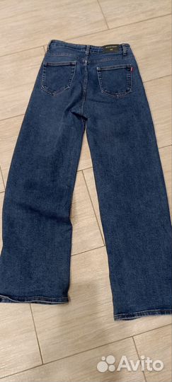 Джинсы широкие женские