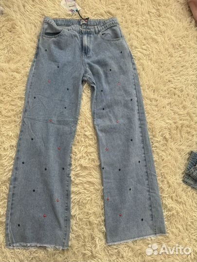 Джинсы широкие