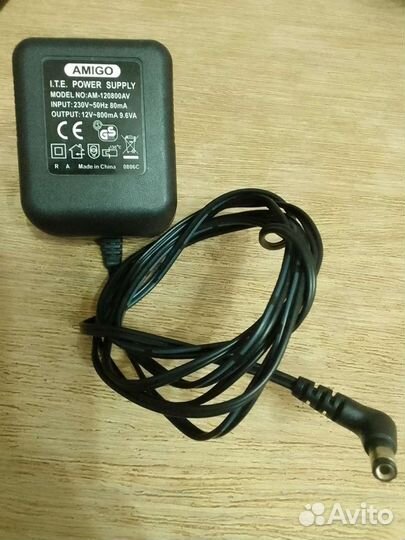 Блок питания адаптер заряд уст Amigo 12v800mA