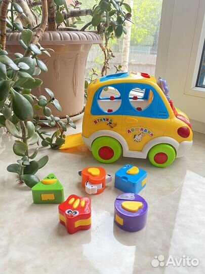 Развивающая игрушка машинка сортер