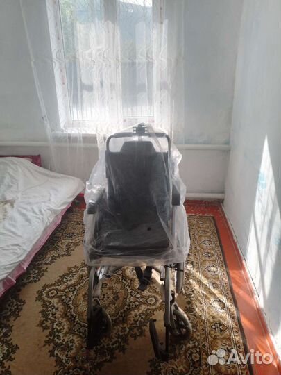 Новая инвалидная коляска