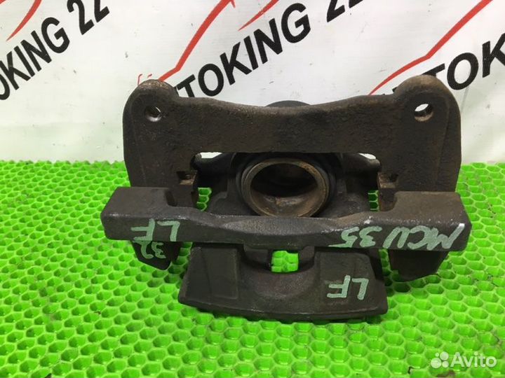 Суппорт тормозной передний левый Toyota Harrier