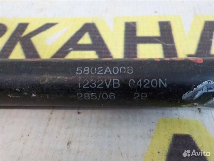 Амортизатор двери багажника Mitsubishi Outlander