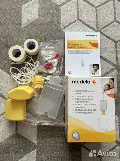 Молокоотсос medela swing электрический