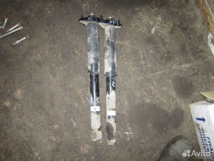 Задний амортизатор стойка Mazda Cx7