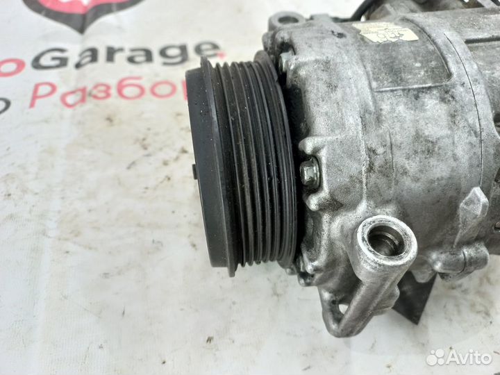 Компрессор кондиционера Mercedes Benz A0002309111