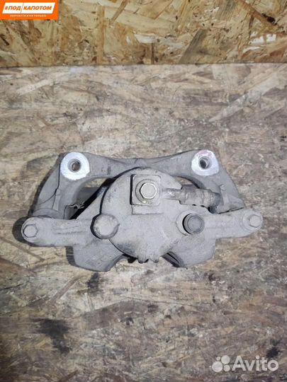 Суппорт тормозной передний левый Opel Astra J