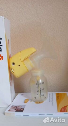 Молокоотсос medela электрический