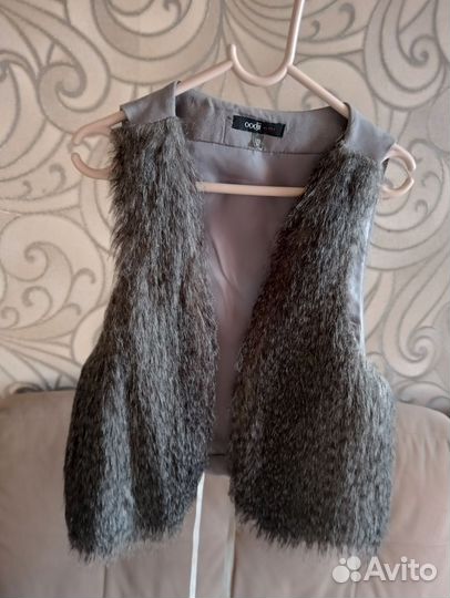 Жилетка меховая женская