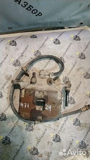 Суппорт передний правый Mitsubishi L200 2006- б/у