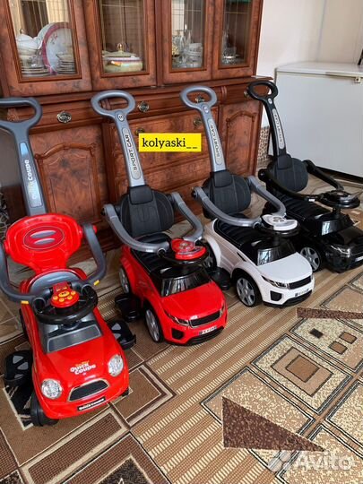 Машинка каталка с ручкой