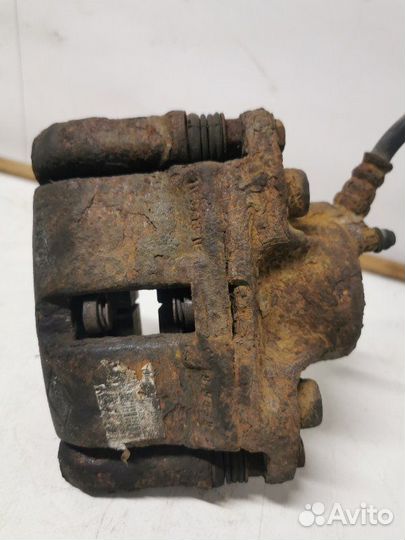 Суппорт тормозной передний правый Renault Logan 1