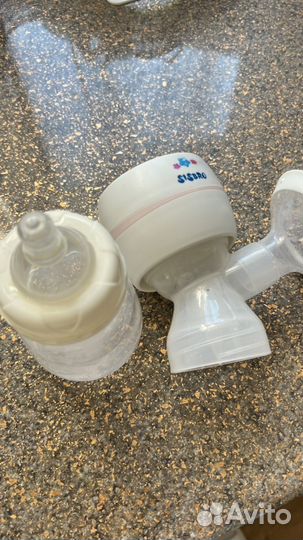 Молокоотсос электрический новый