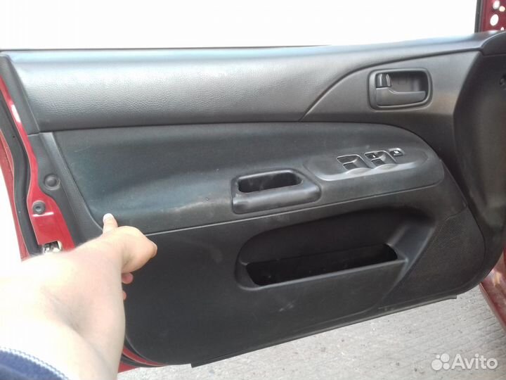 Обшивки дверей (салона) Mitsubishi Lancer 9