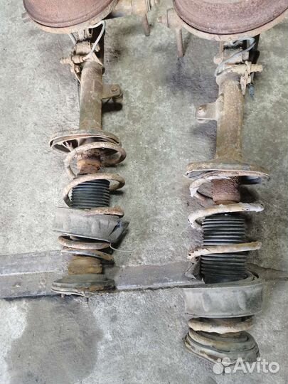 Задние стойки Toyota carina e