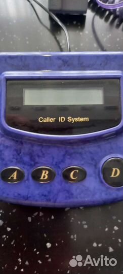 Стационарный телефон и определитель