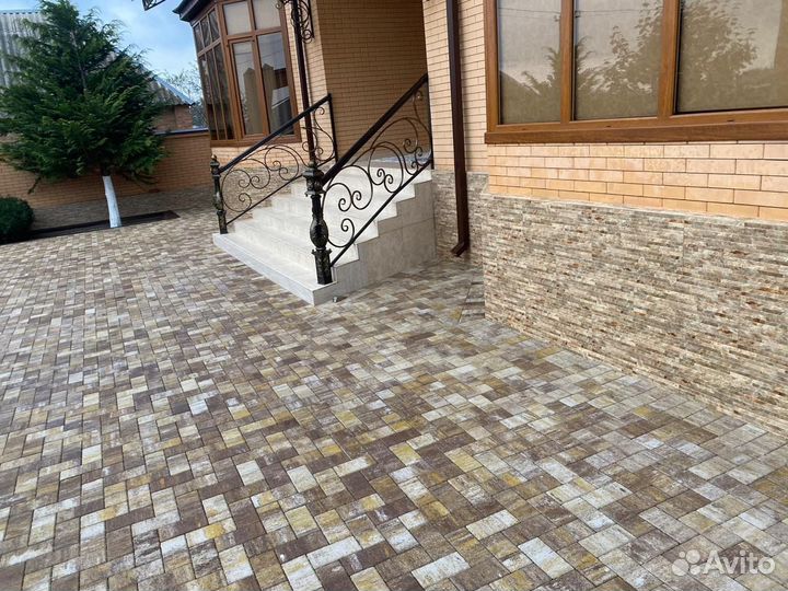 Укладка тротуарной плитки брусчатки