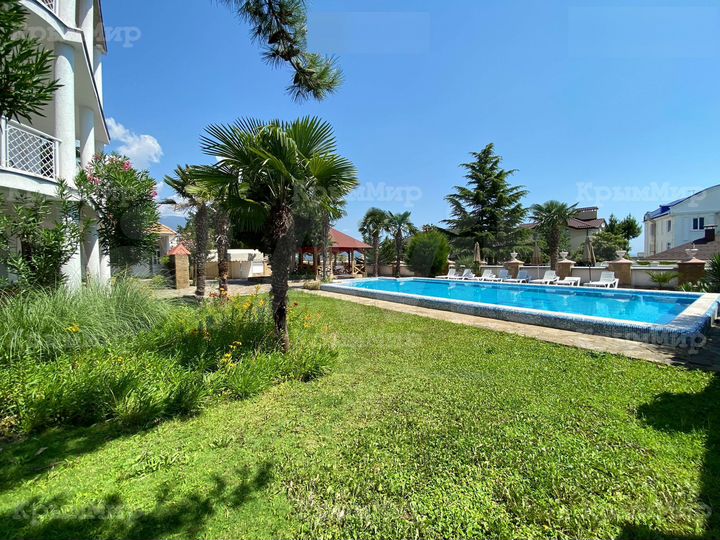 Дом 400 м² на участке 12 сот.