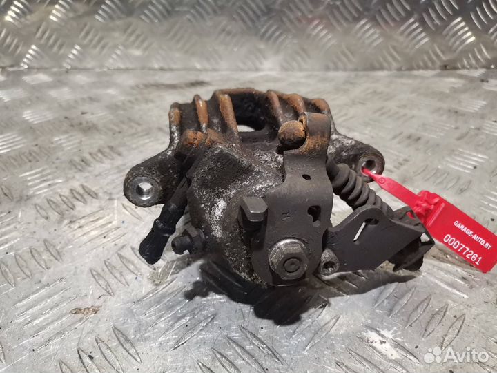 Суппорт тормозной задний правый Skoda Roomster