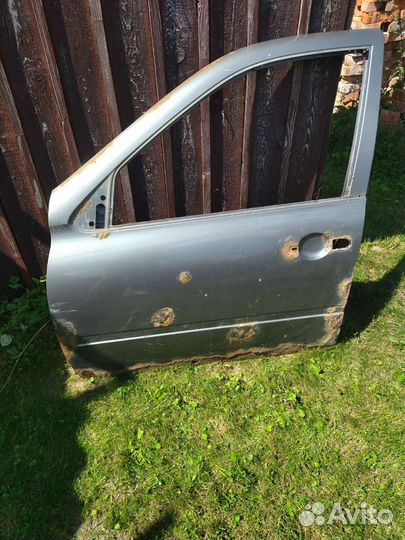 Дверь калина передняя левая