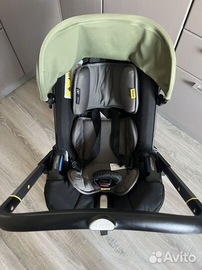 Коляска автокресло doona с базой isofix