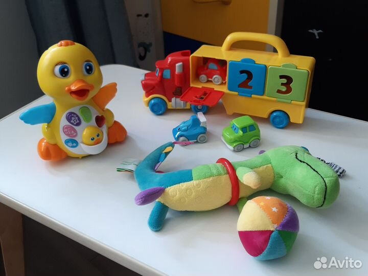 Музыкальные игрушки. Уточка beby go