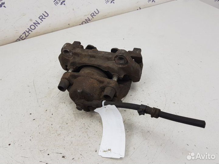 Суппорт тормозной передний левый Opel Vectra