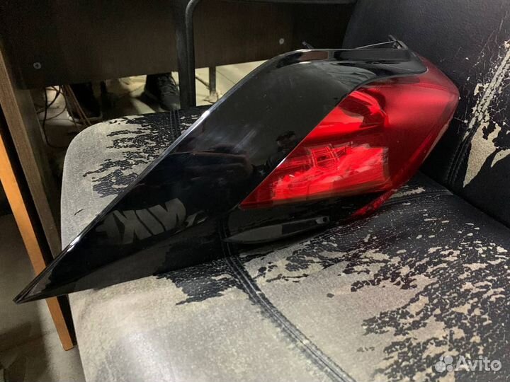 Фонарь левый в крыло Toyota Rav 4 XA 50