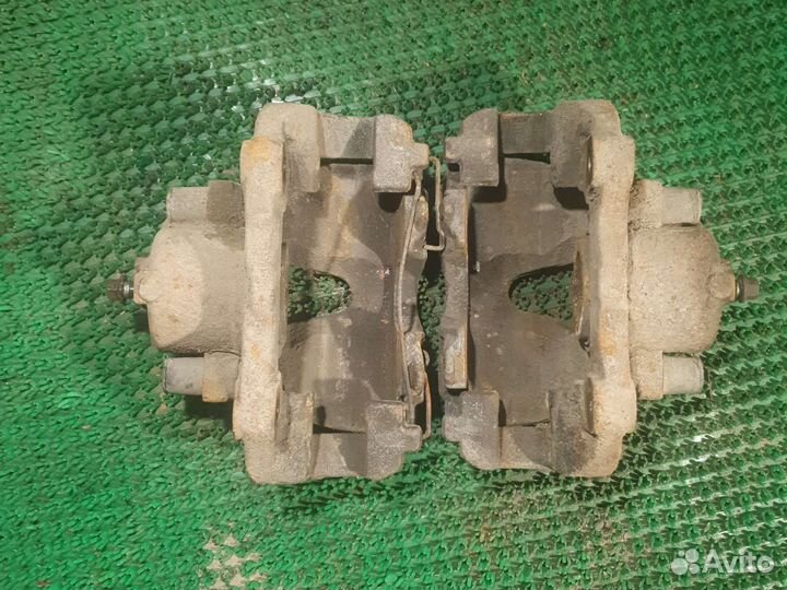 Суппорт тормозной передний Opel Astra GTC H