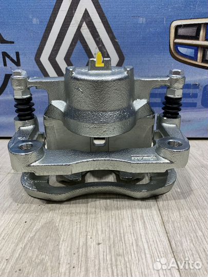 Суппорт тормозной задний Renault koleos Лев