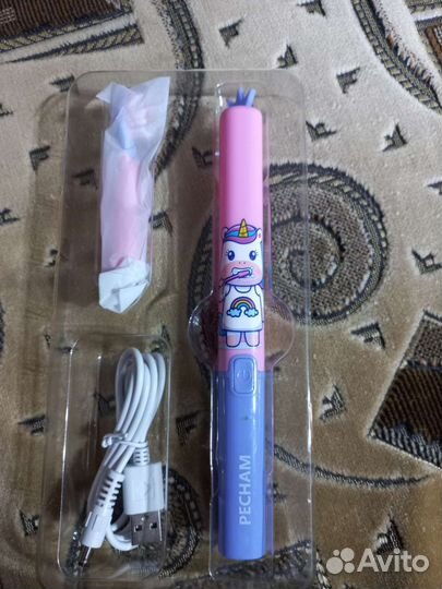 Электрическая зубная щетка детская