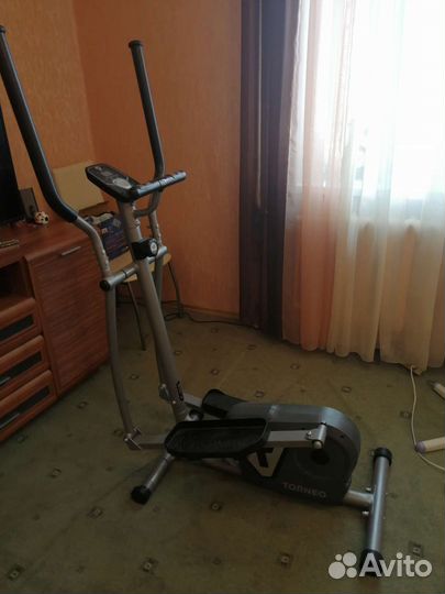 Эллиптический тренажер torneo